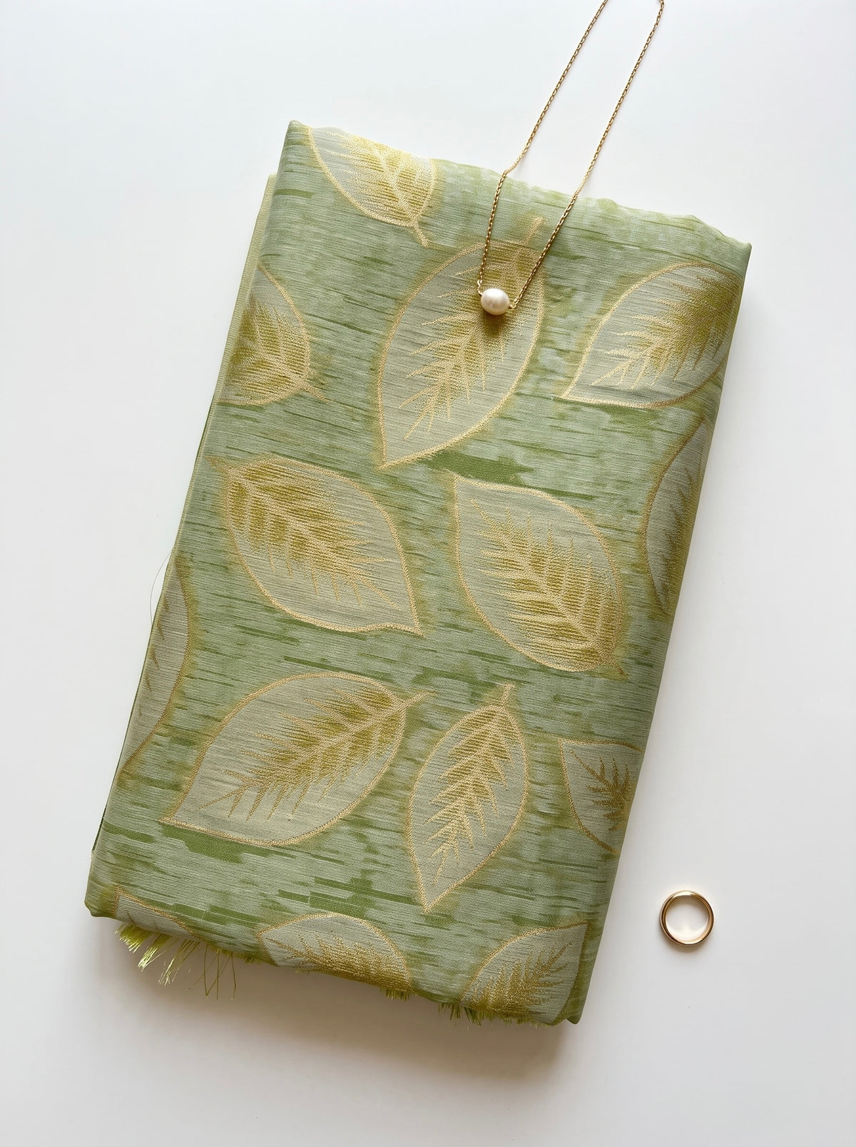 Chanderi saree in pastel shades with woven zari and thread leaves pattern