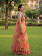 Chanderi cotton saree with woven floral and peacocok motifs