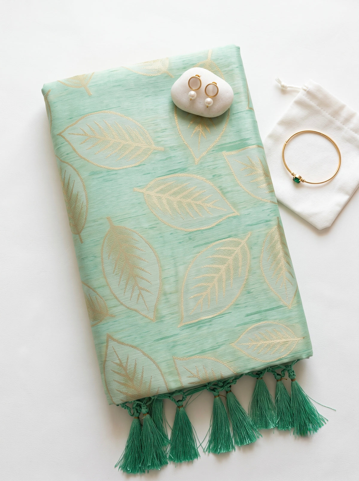 Chanderi saree in pastel shades with woven zari and thread leaves pattern