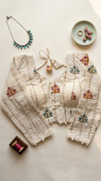 Khadi full sleeve blouse with floral thread embroidery motifs