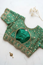 Sequin and thread heavy embroidered blouse