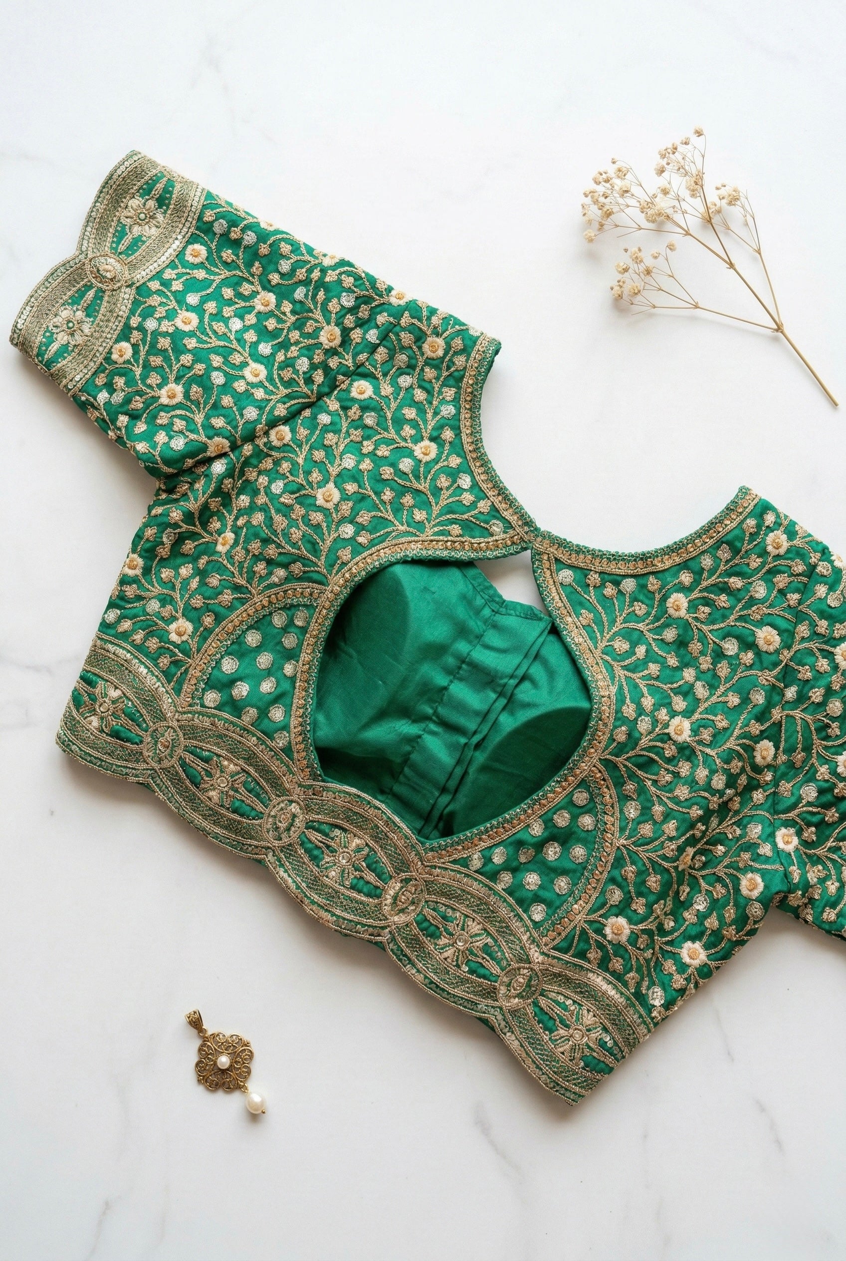 Sequin and thread heavy embroidered blouse