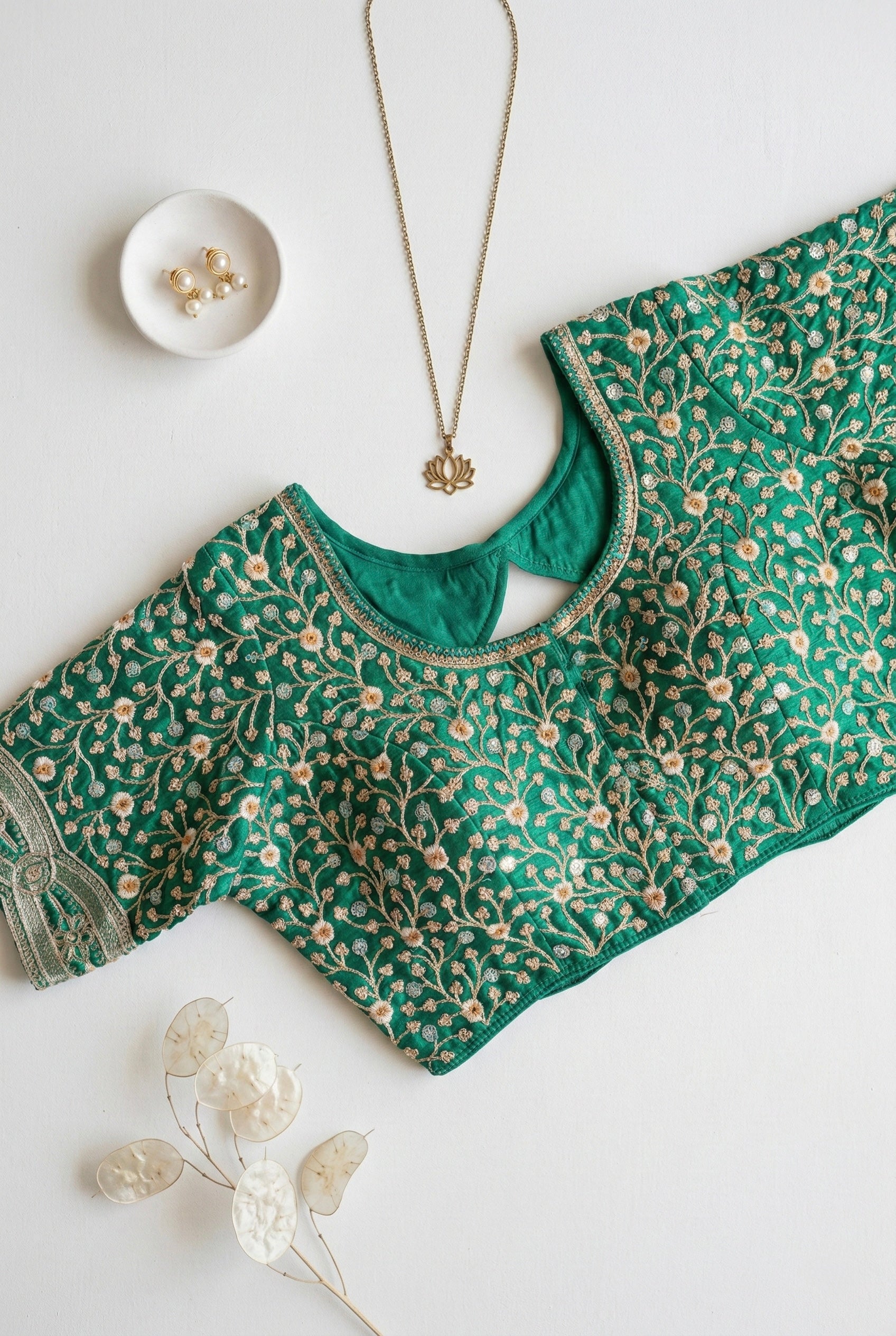 Sequin and thread heavy embroidered blouse