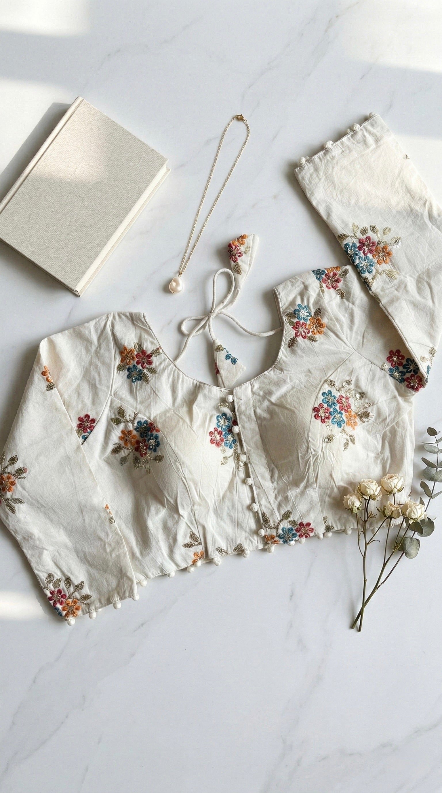 Khadi full sleeve blouse with thread and sequin embroidery motifs