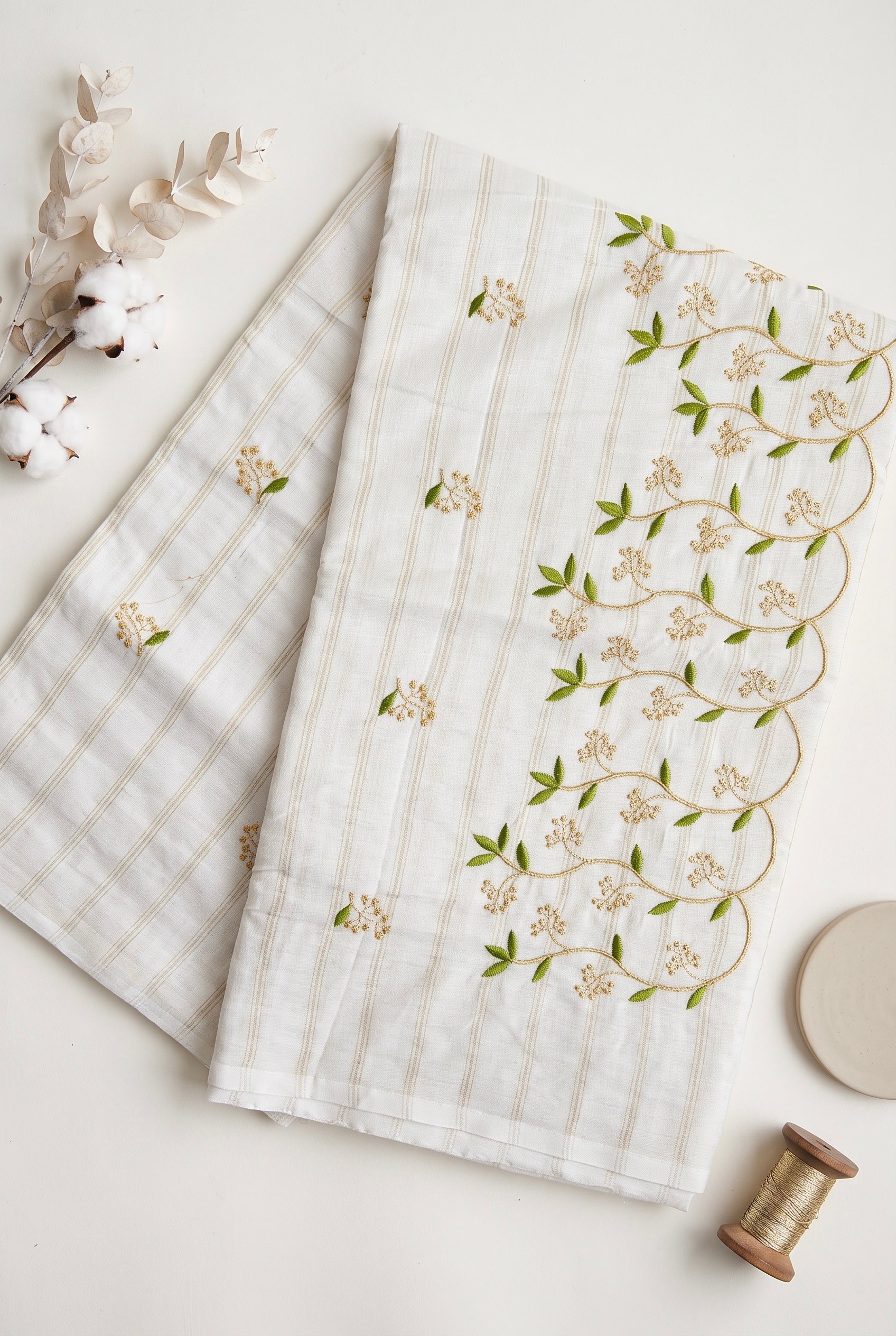 Kerala embroidered saree in gold stripes and thread work