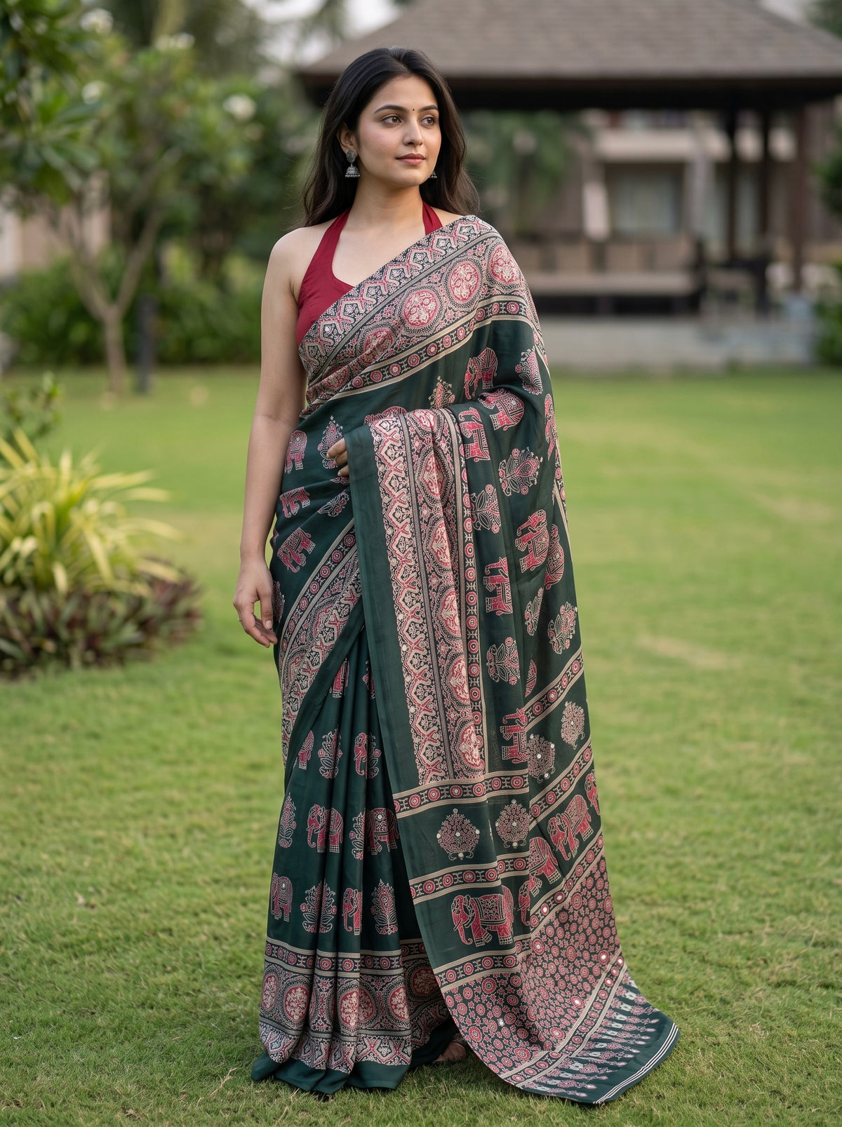 Karishma-Ajrakh print semi modal saree with real mirror and elephant design