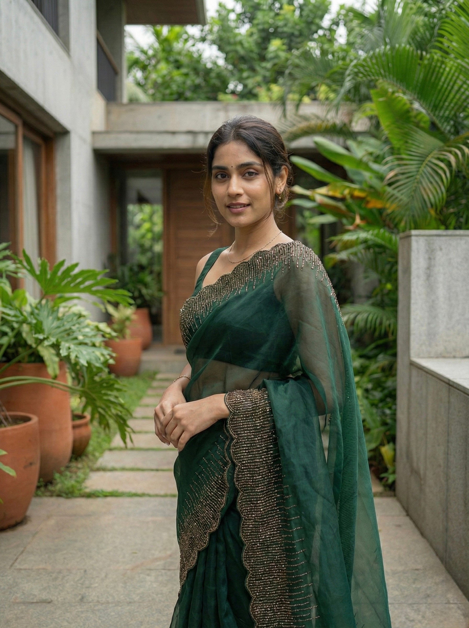 Organza saree with zari and sequin borders