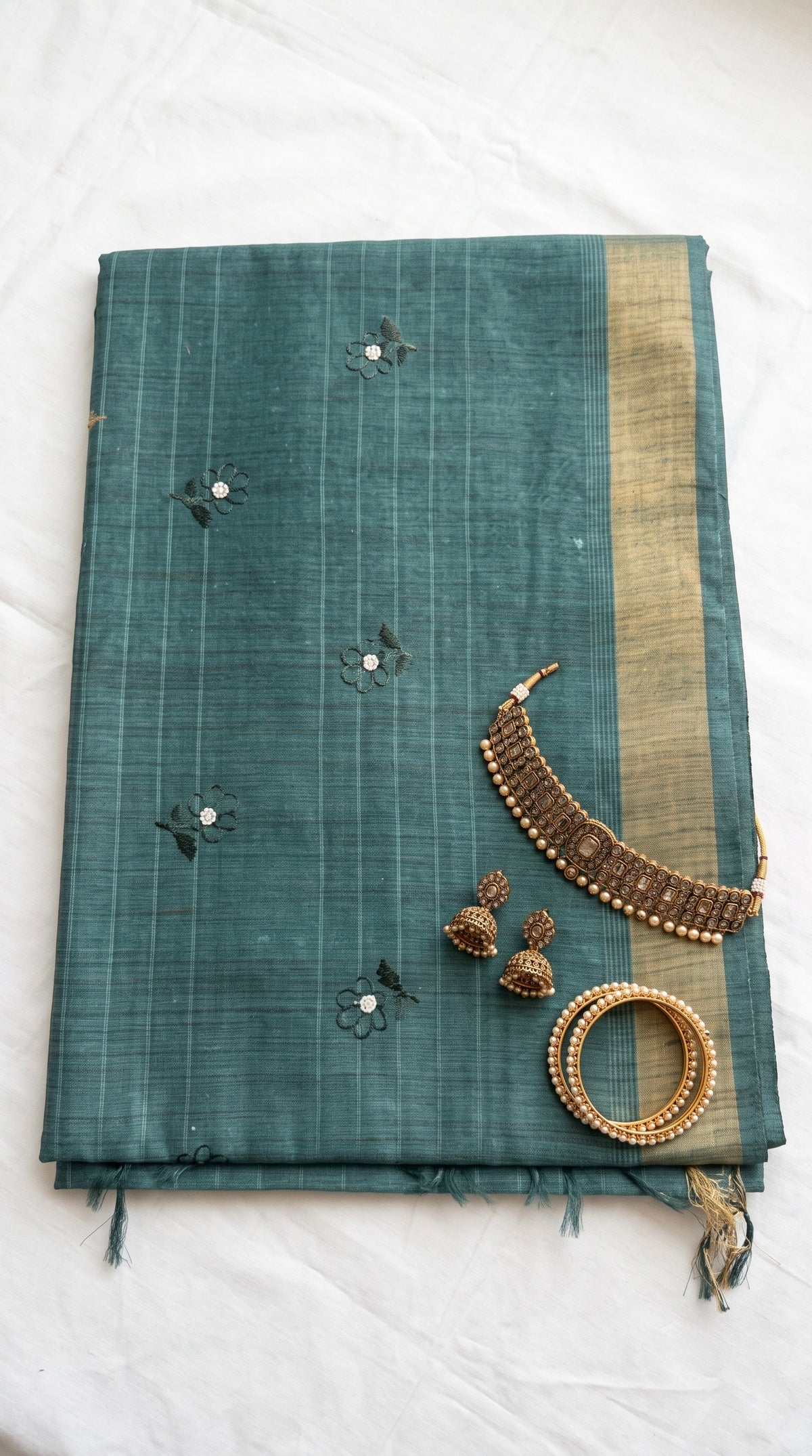 Daya-Semi tussar saree with small floral embroidery motifs