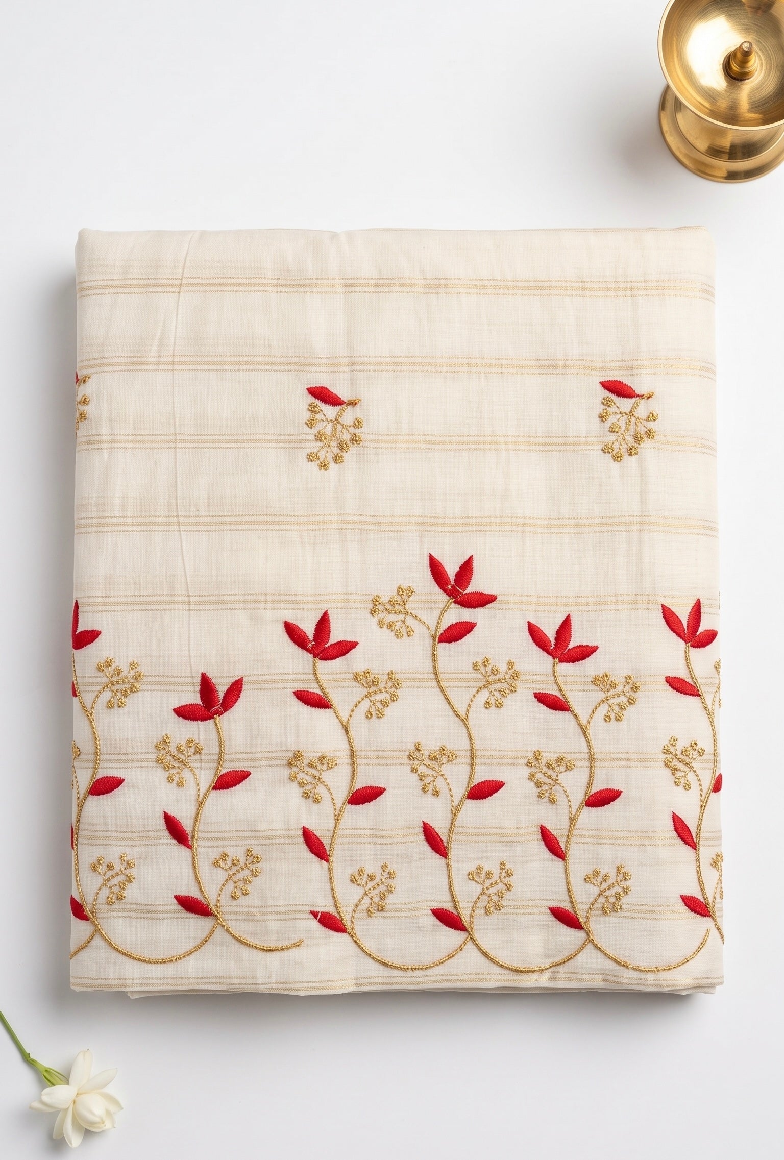 Kerala embroidered saree in gold stripes and thread work