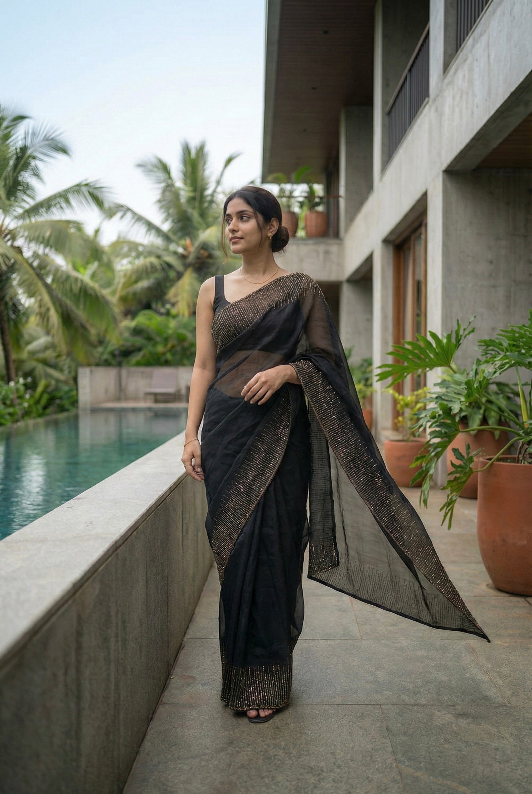 Organza saree with zari and sequin borders