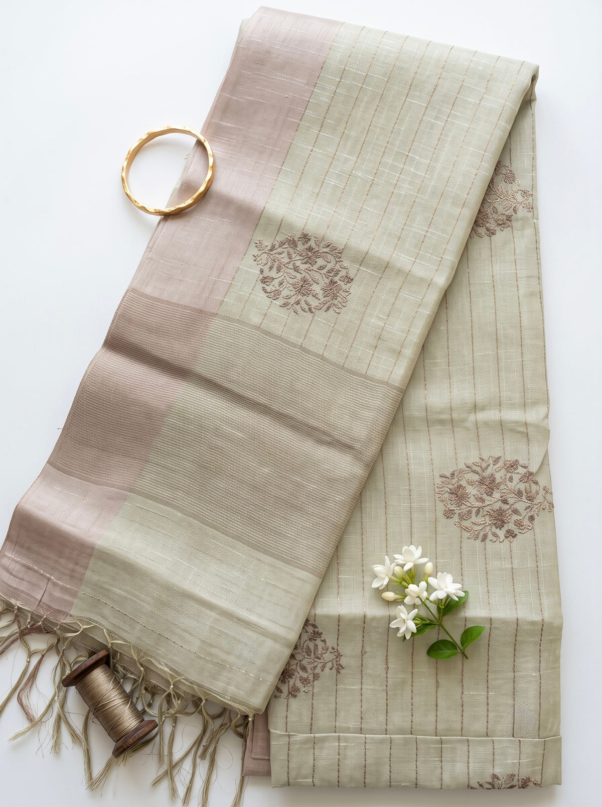 Chanderi saree in pastel shades and zari embroidery motifs