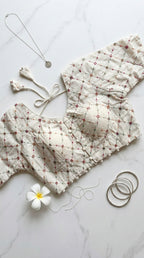 Khadi half sleeve padded blouse in grid pattern embroidery