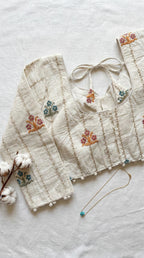 Khadi full sleeve blouse with floral thread embroidery motifs