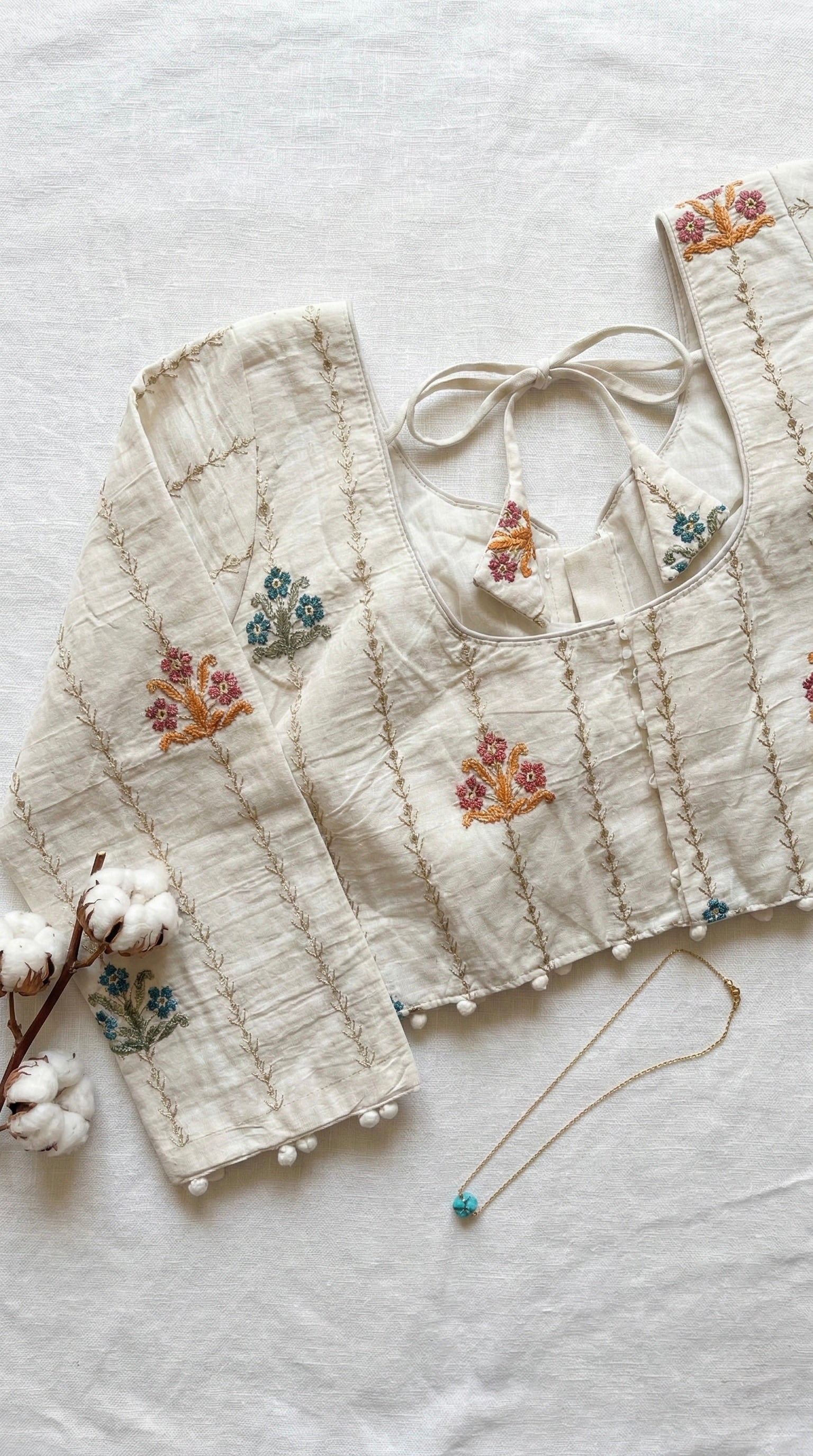 Khadi full sleeve blouse with floral thread embroidery motifs