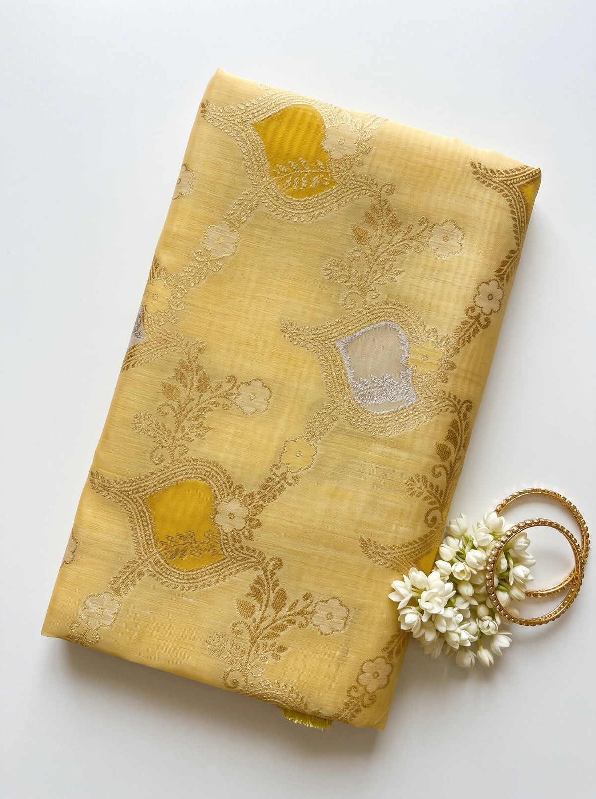 Orchid- Chanderi saree in pastel shades with woven zari and Floral pattern