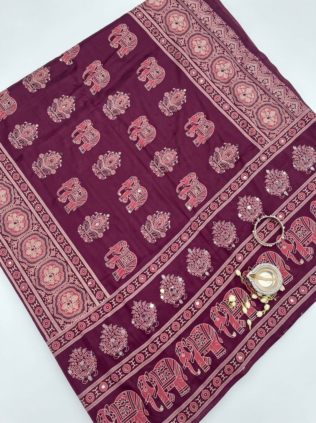Karishma-Ajrakh print semi modal saree with real mirror and elephant design