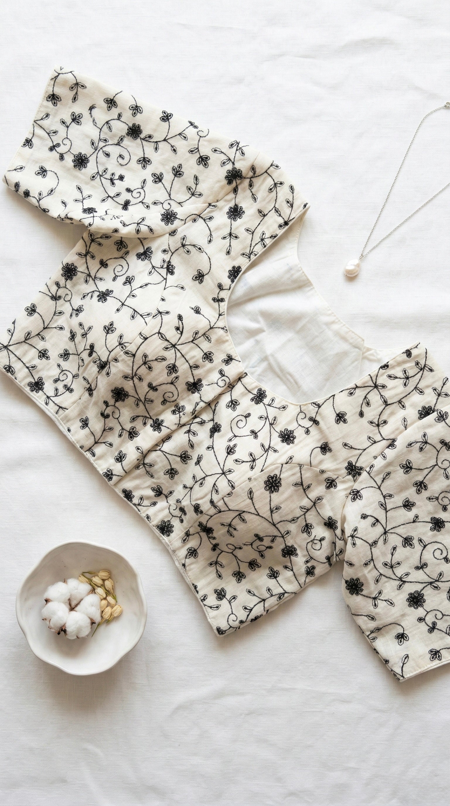 Khadi half sleeve padded blouse in floral embroidery