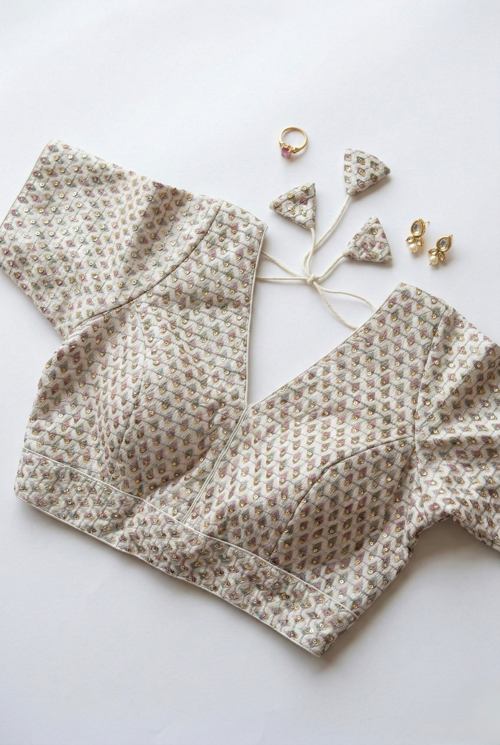 V-neck silk blouse with sequin and thread work