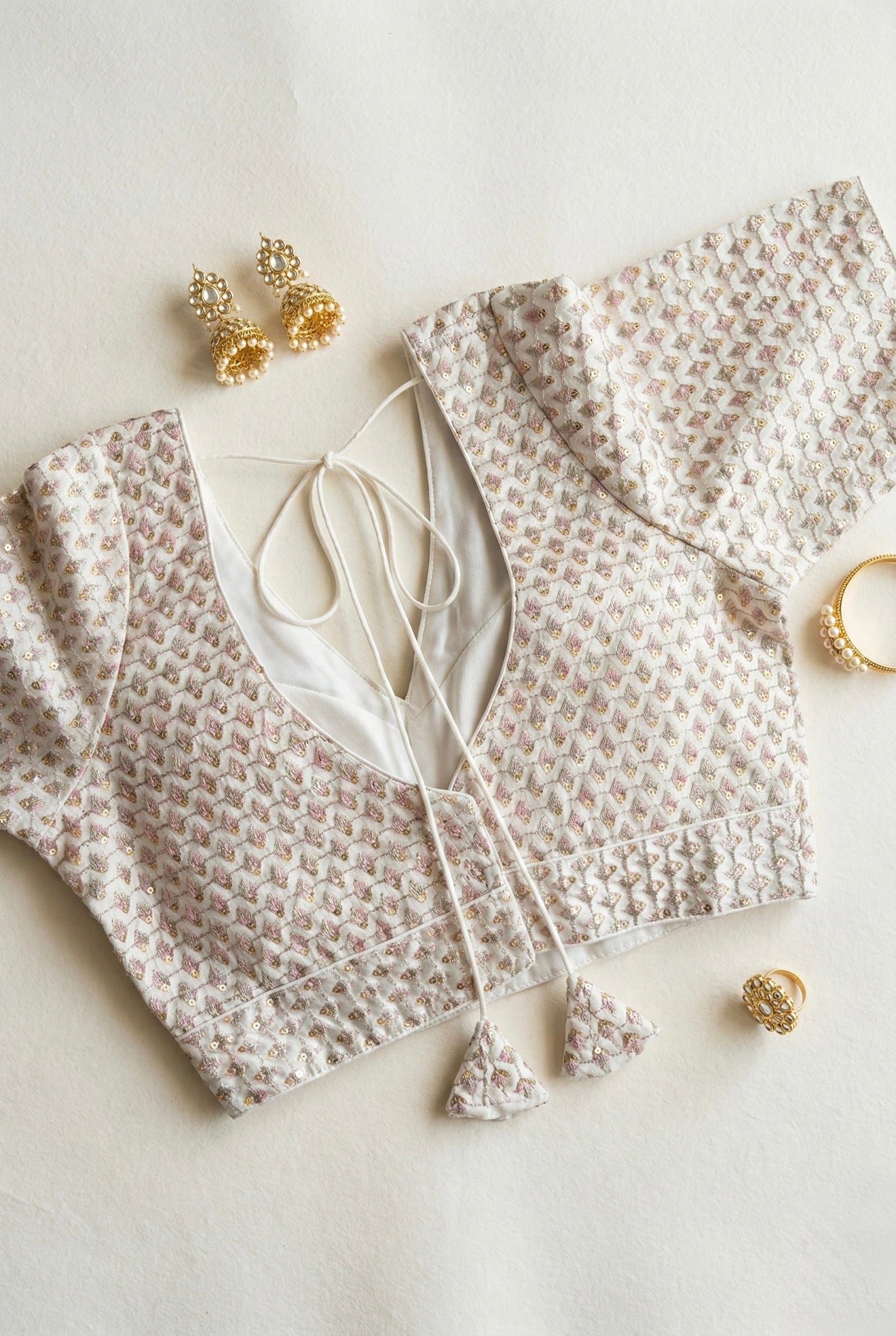 V-neck silk blouse with sequin and thread work