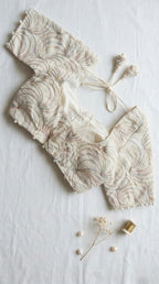 Khadi half sleeve padded blouse in swirl embroidery pattern