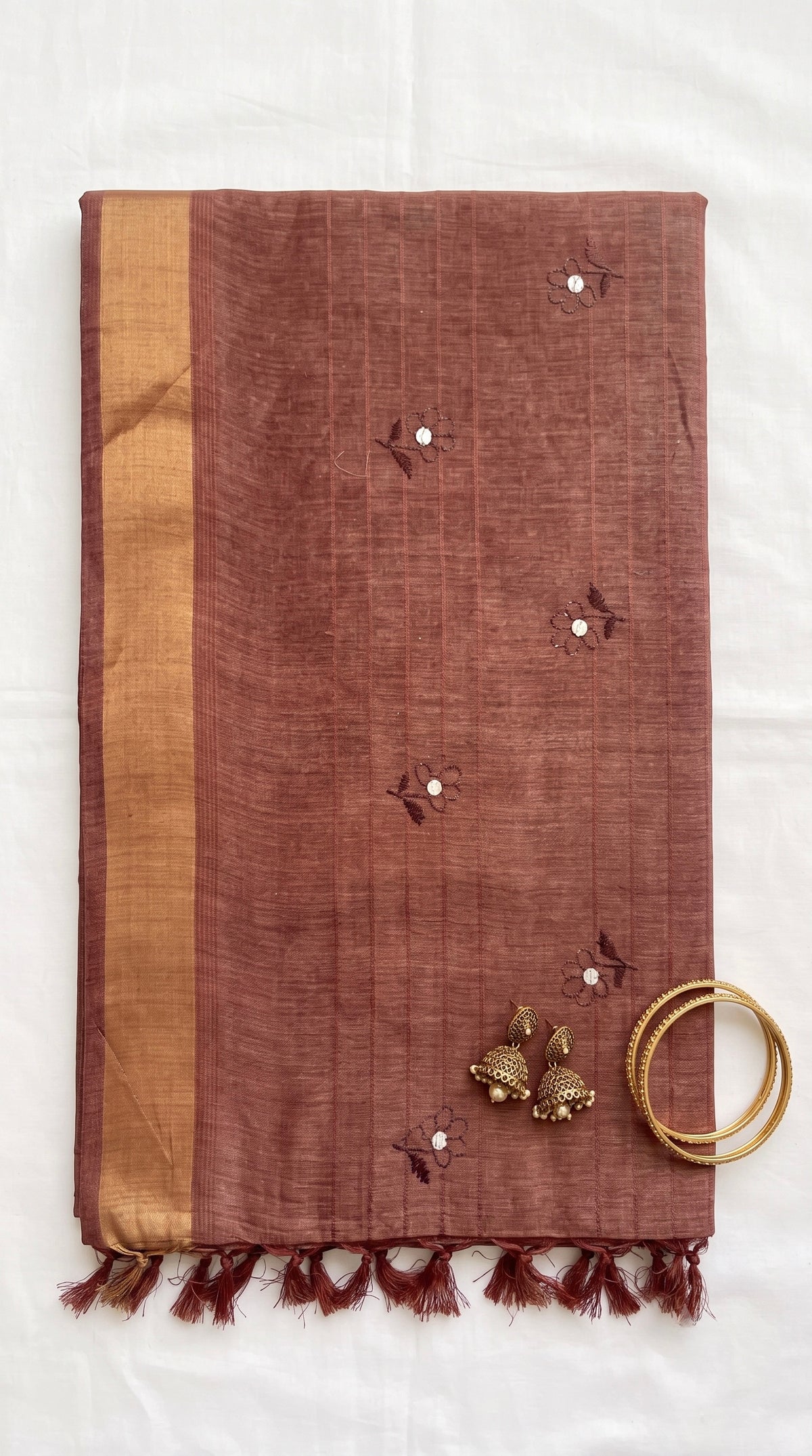 Daya-Semi tussar saree with small floral embroidery motifs