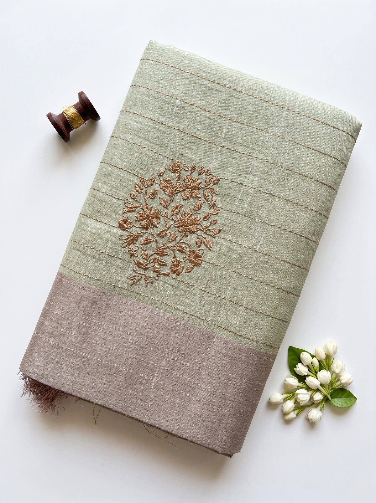 Chanderi saree in pastel shades and zari embroidery motifs