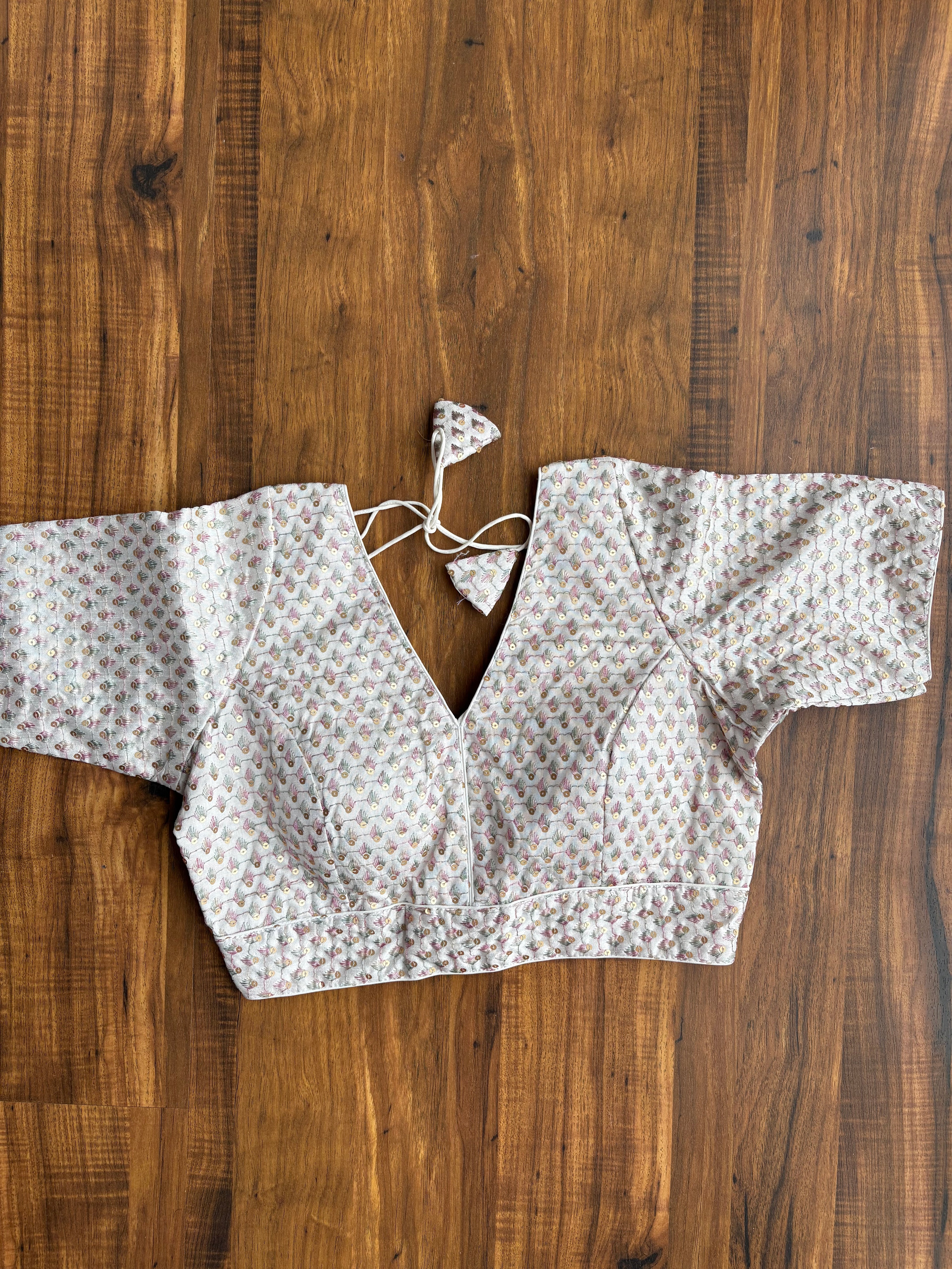 V-neck silk blouse with sequin and thread work