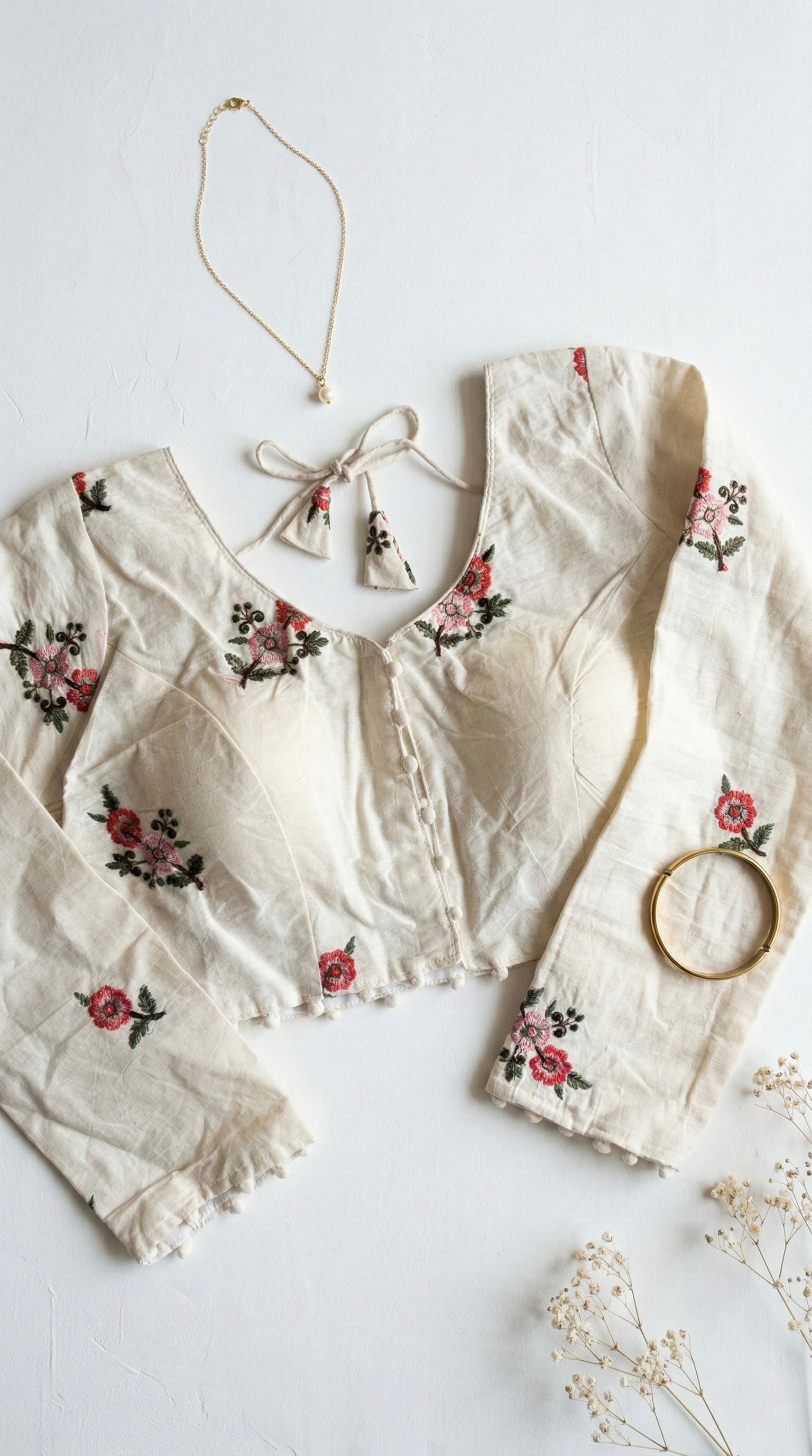 Khadi full sleeve blouse with floral motifs