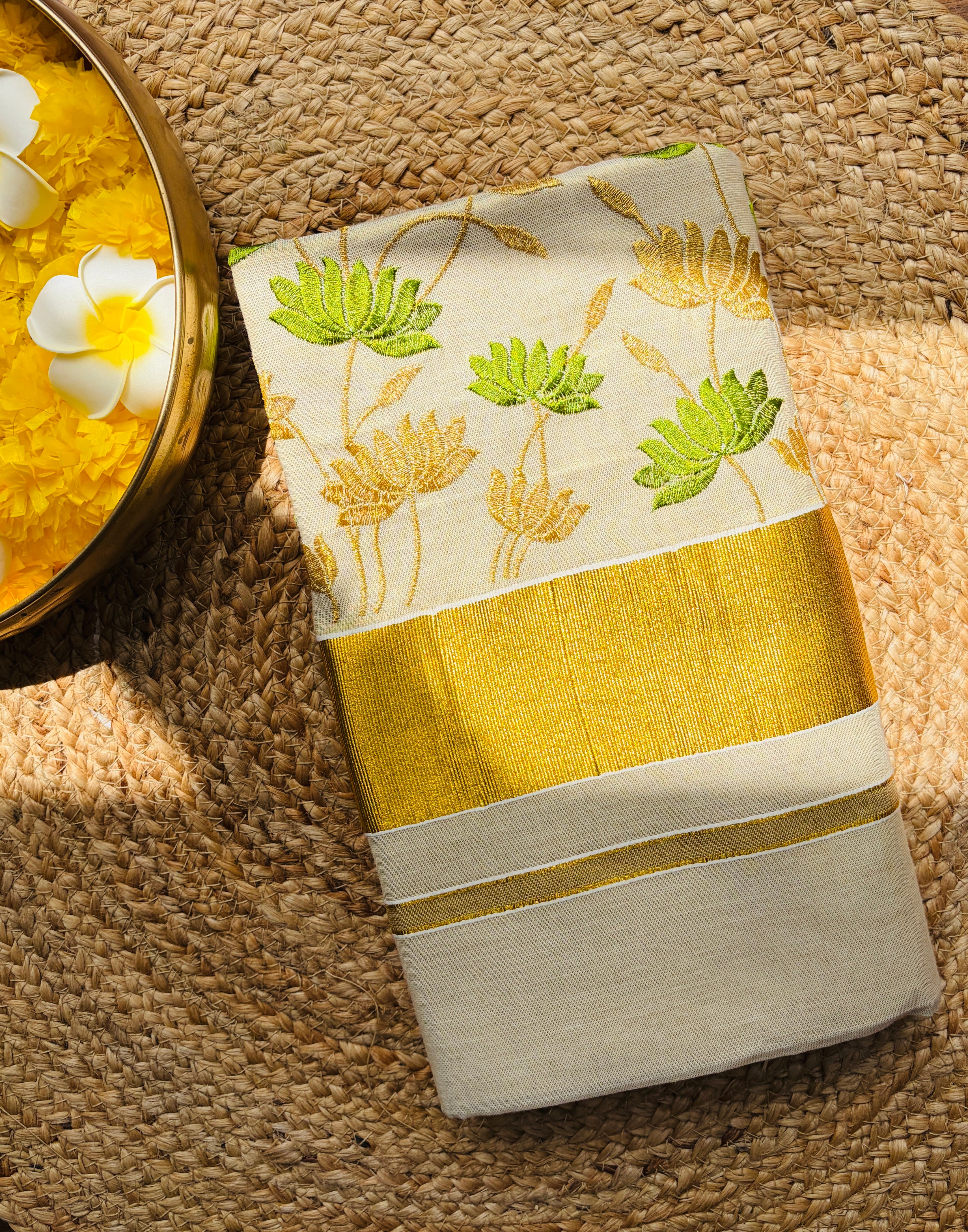 Kerala kasavu saree in lotus embroidery