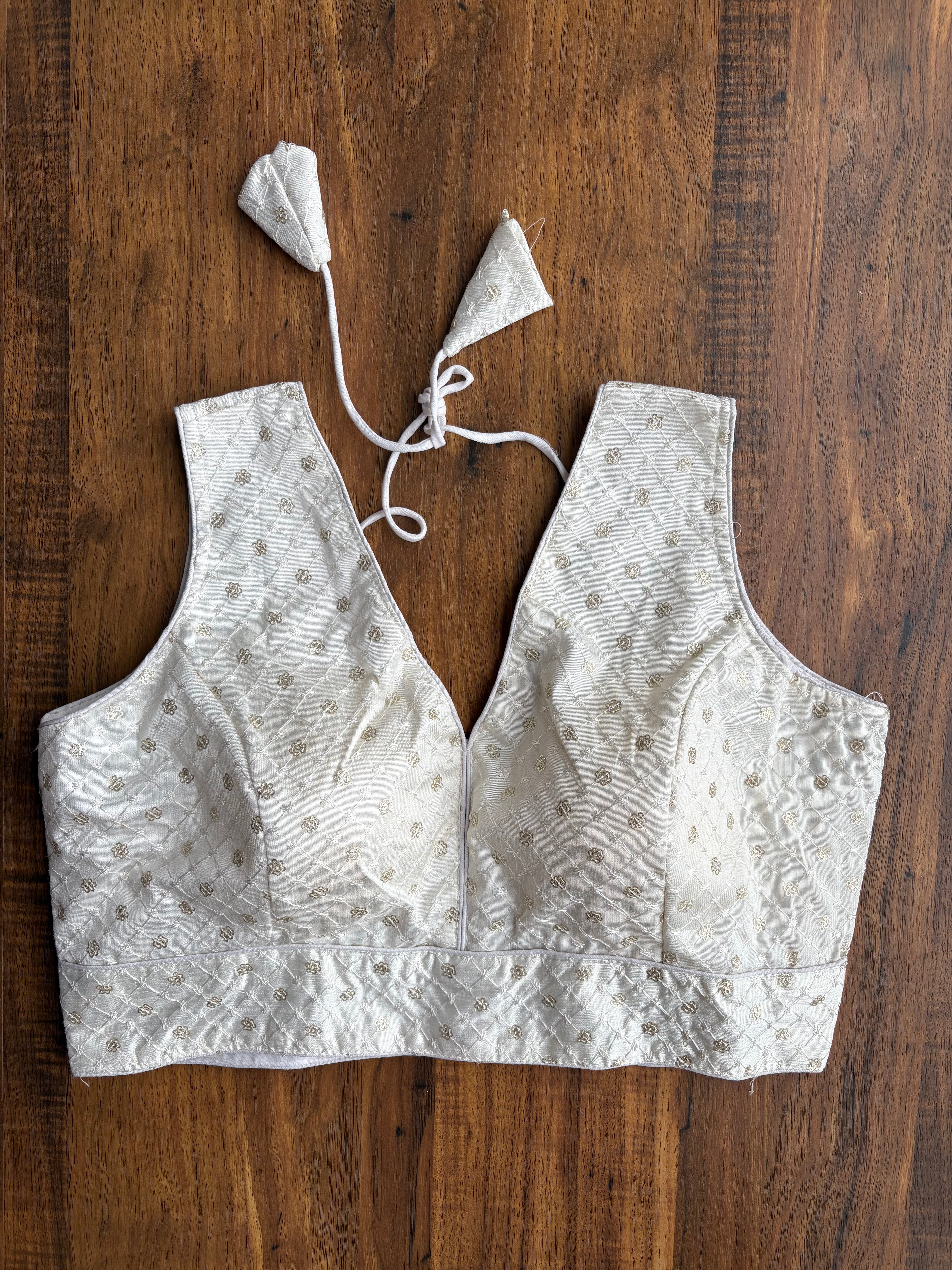 V-neck silk blouse with sequin work