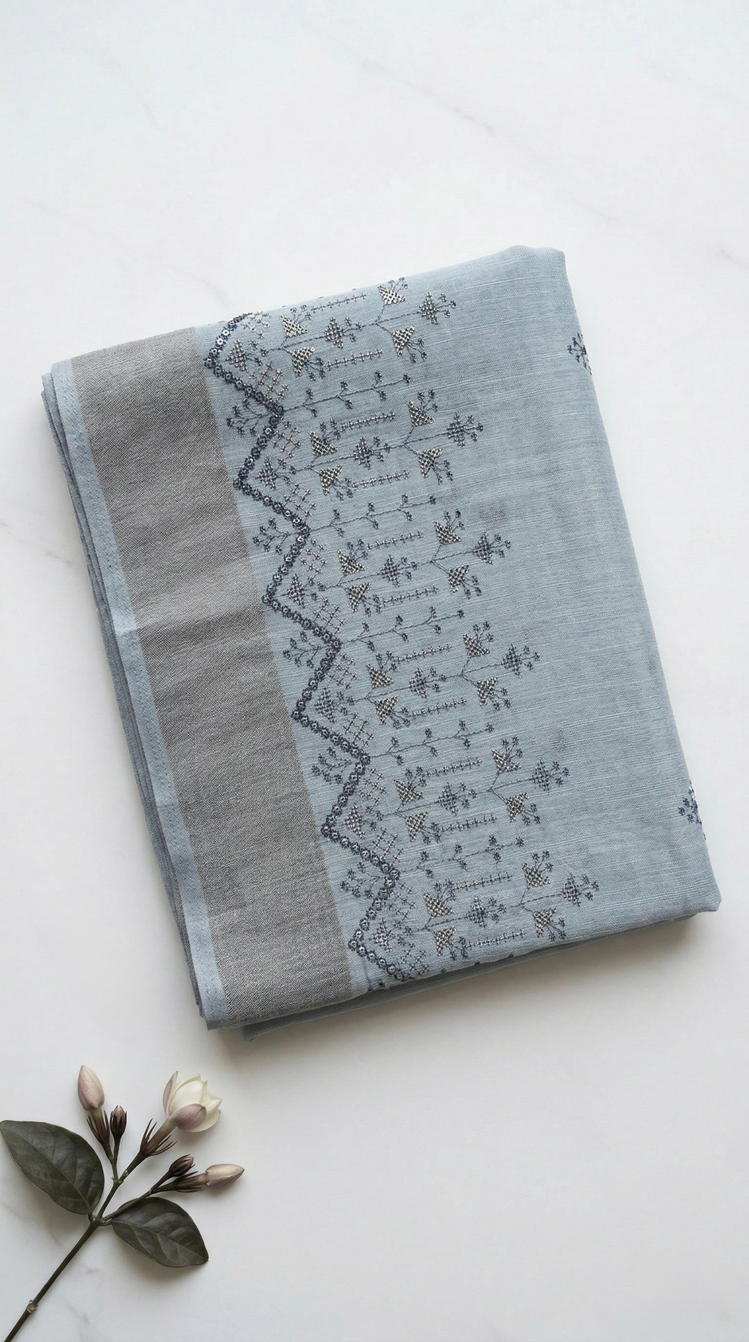 Soft linen saree with embroidered border