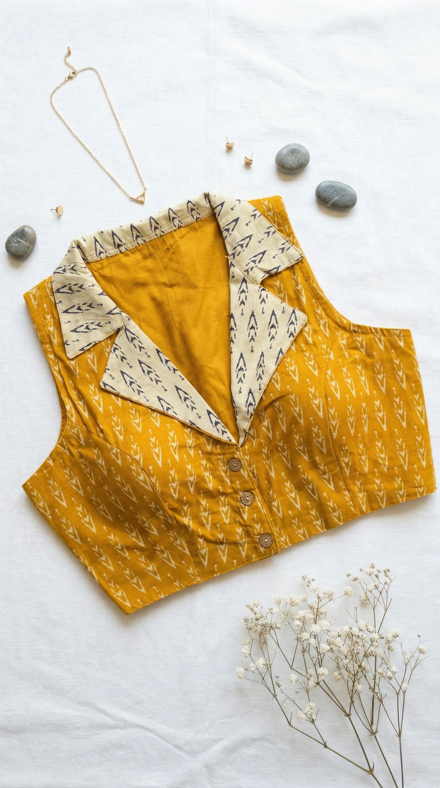 Ikkat notched collar padded sleeveless blouse