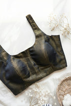 Noir Glow - Sleeveless padded shimmer blouse