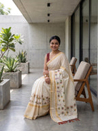Kerala kasavu saree with handpainted floral design