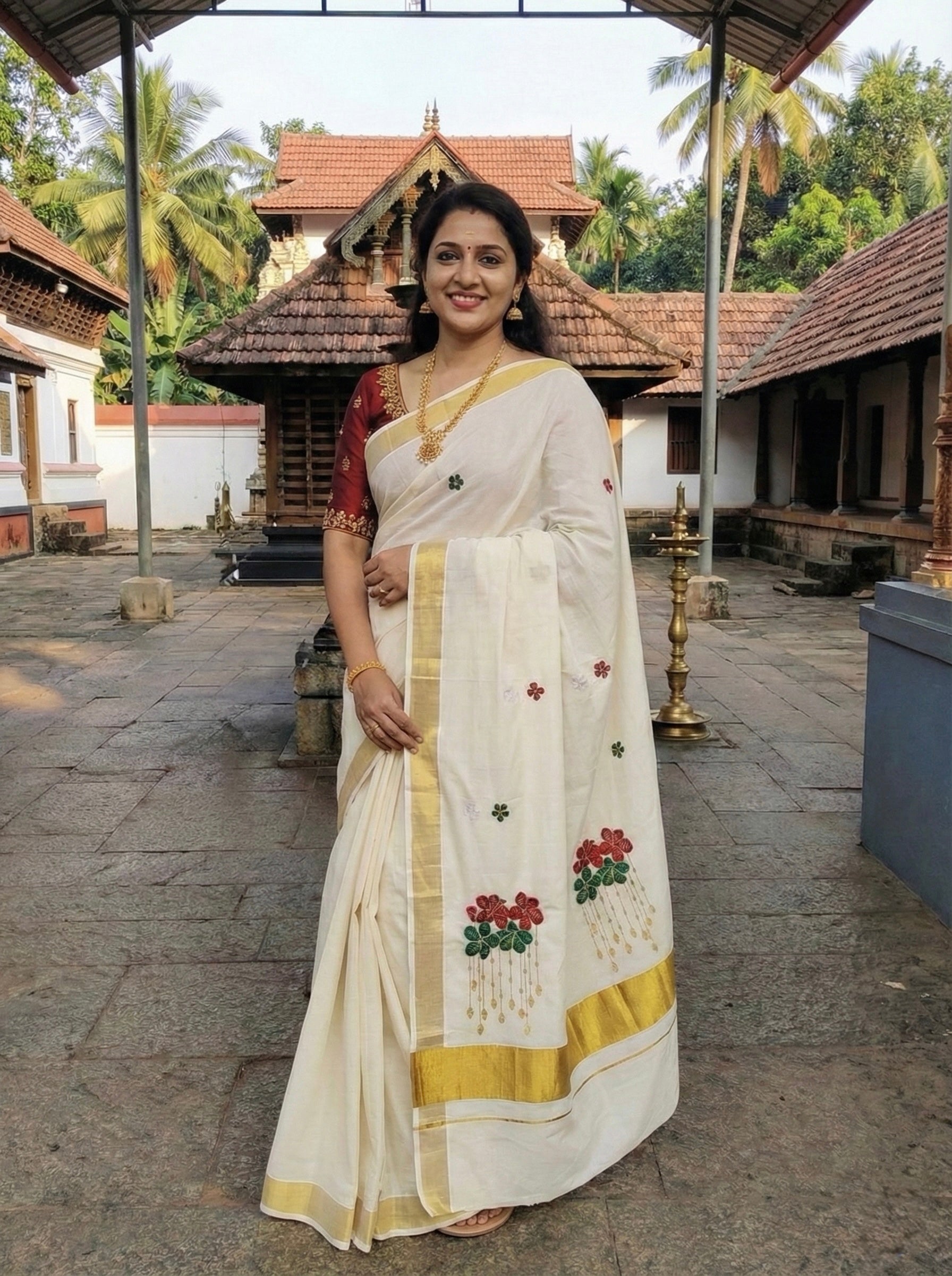 Kerala kasavu saree with floral embroidery