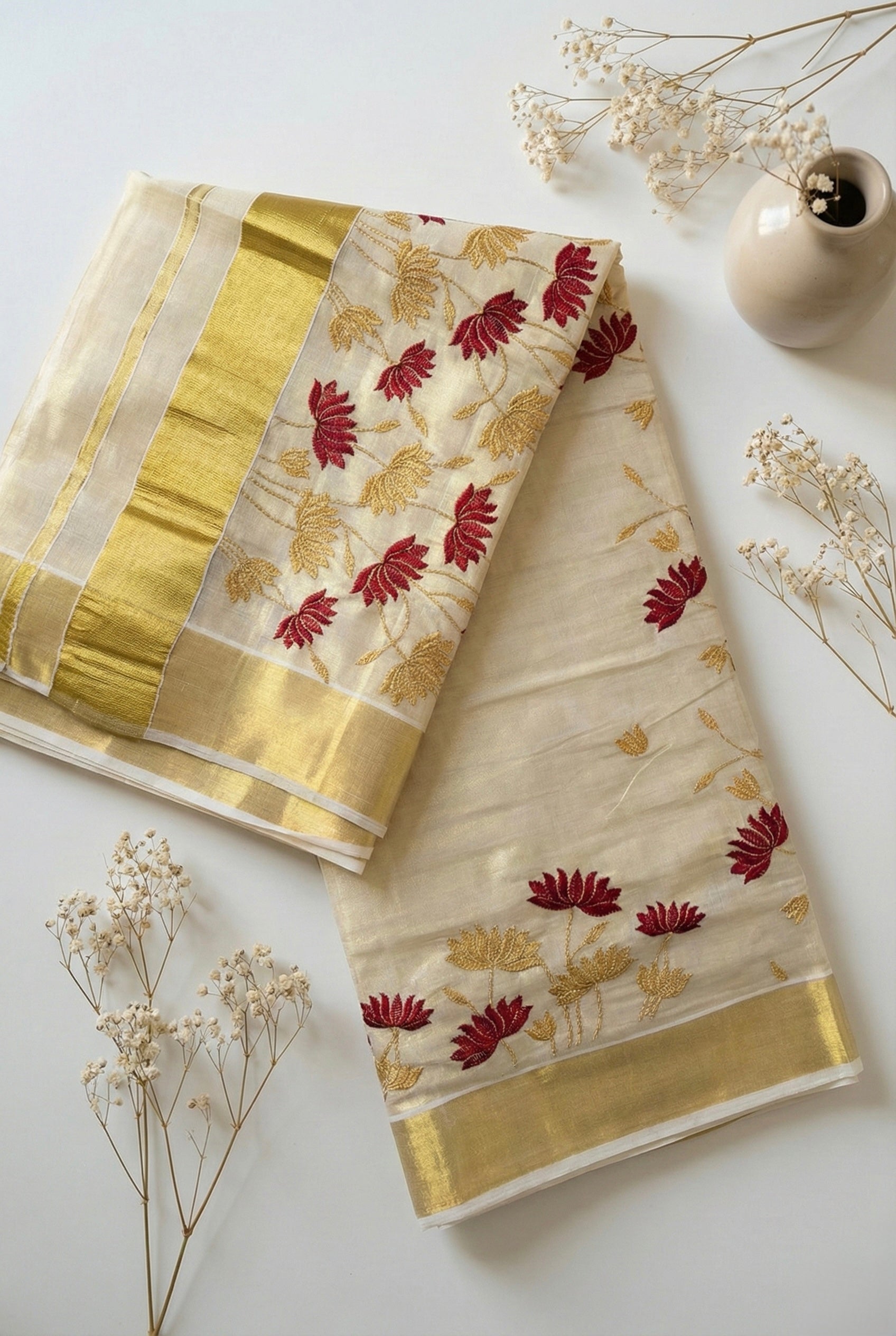 Kerala kasavu saree in lotus embroidery