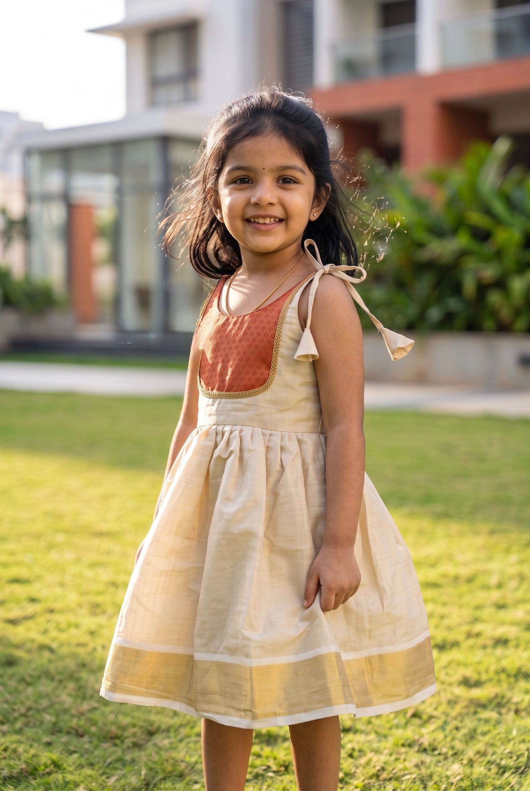 Manjadi- Gold& Red tissue ethnic frock with tie for girls