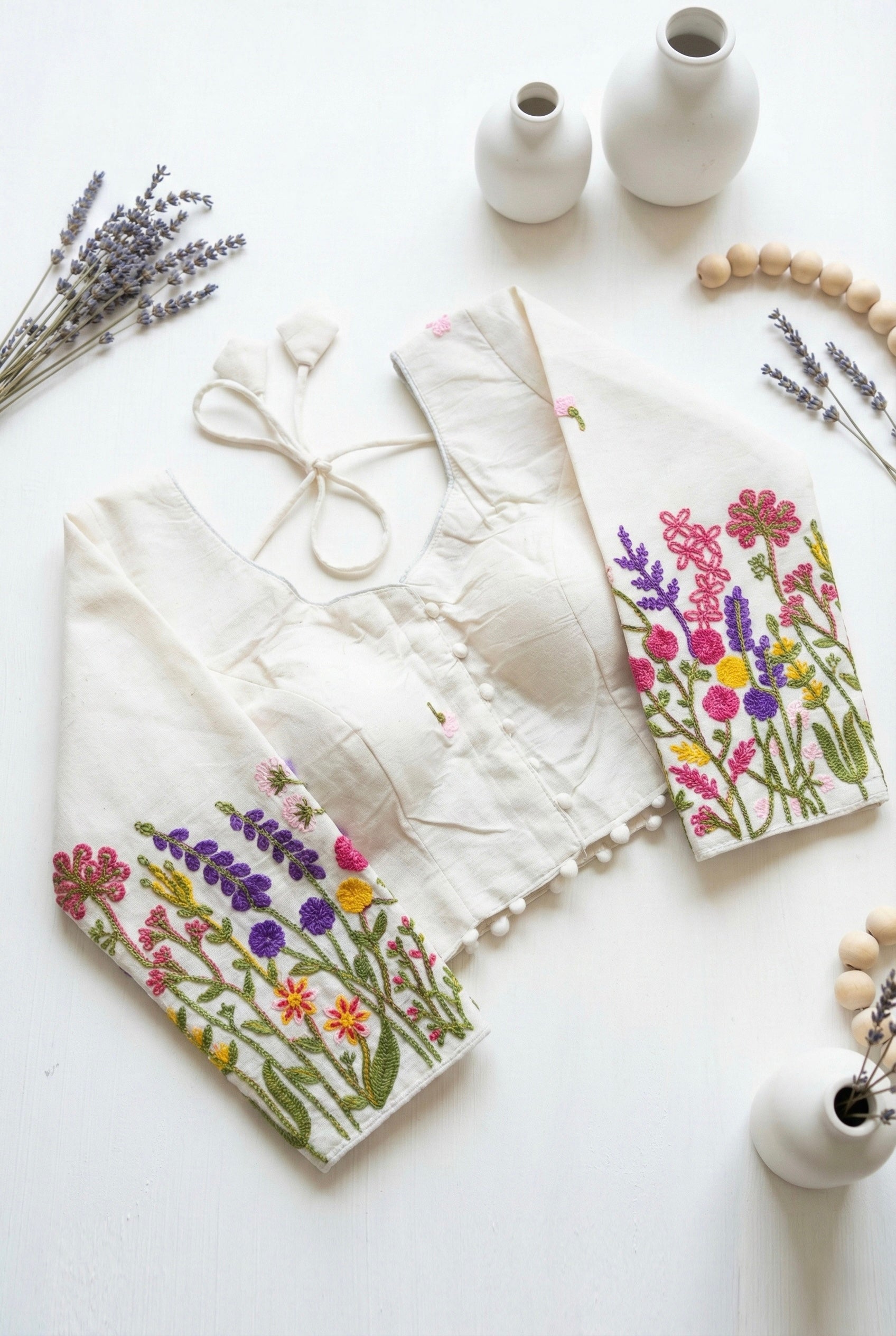 Khadi full sleeve blouse with floral embroidery on sleeves