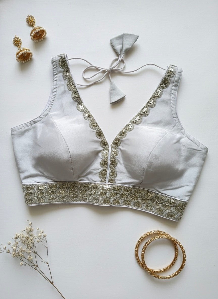 V-neck silk blouse with sequin work