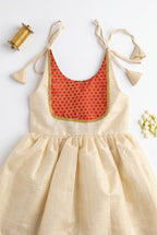 Manjadi- Gold& Red tissue ethnic frock with tie for girls