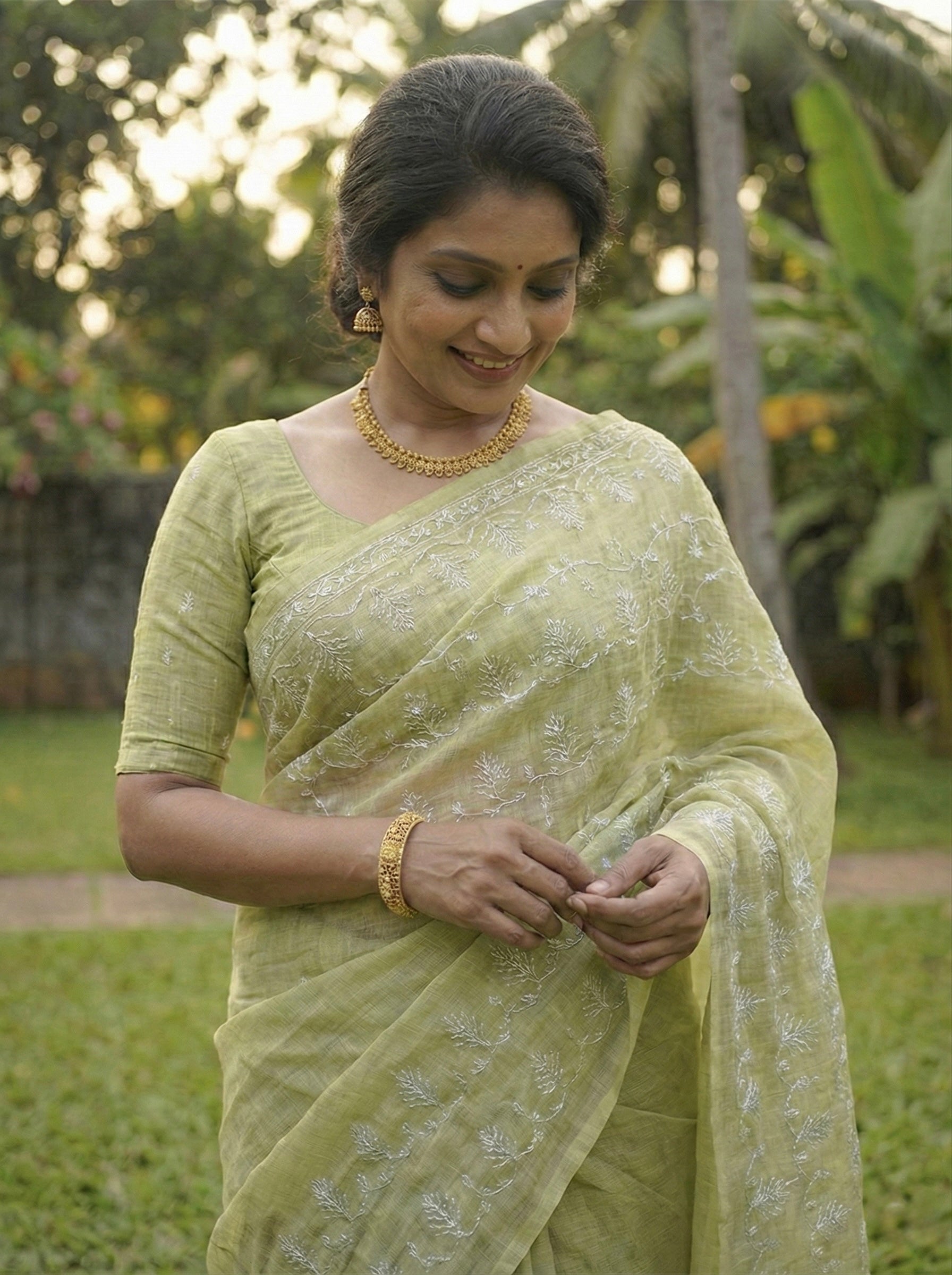 Kota tissue saree in light olive shade