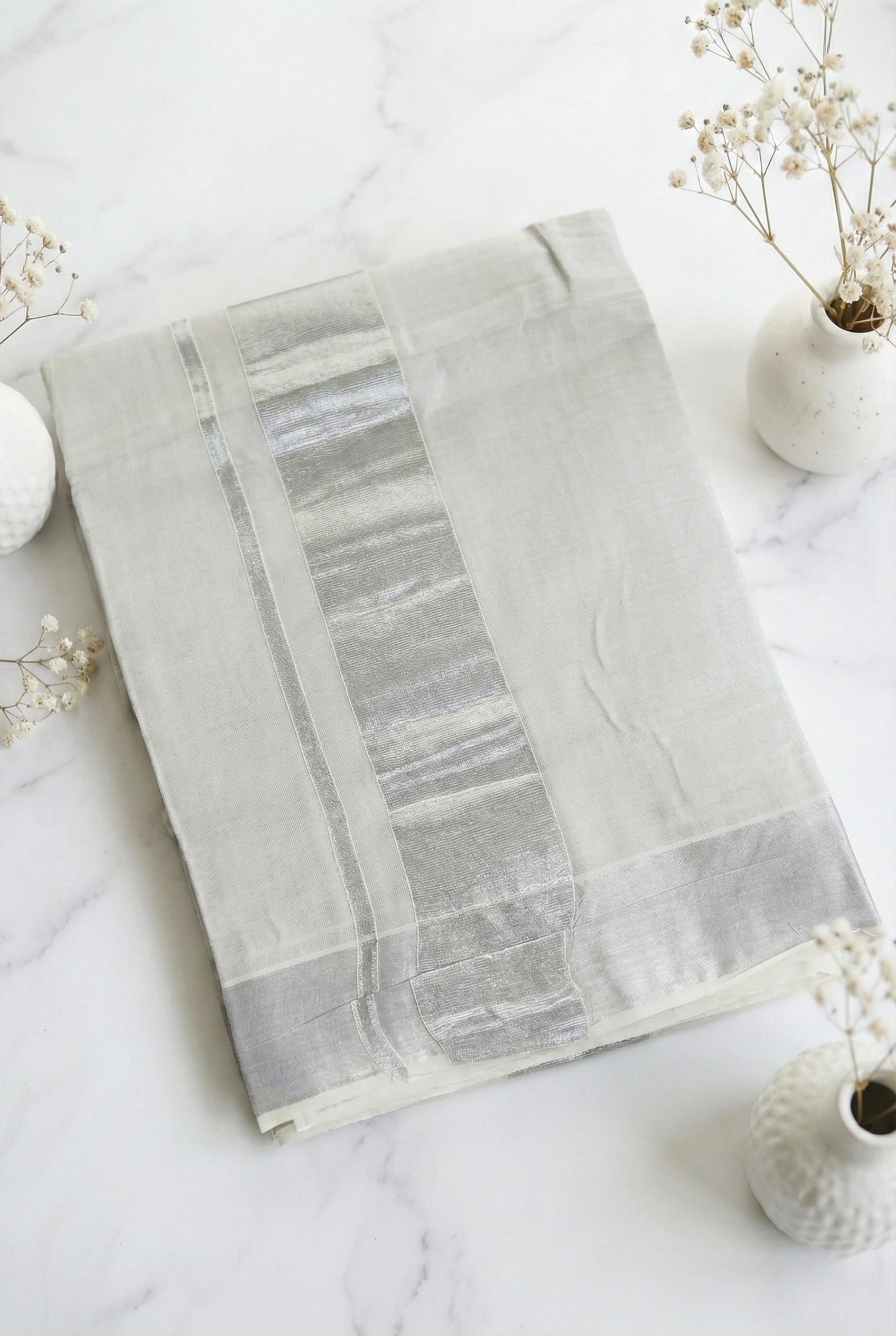 Kerala silver plain tissue saree with silver zari