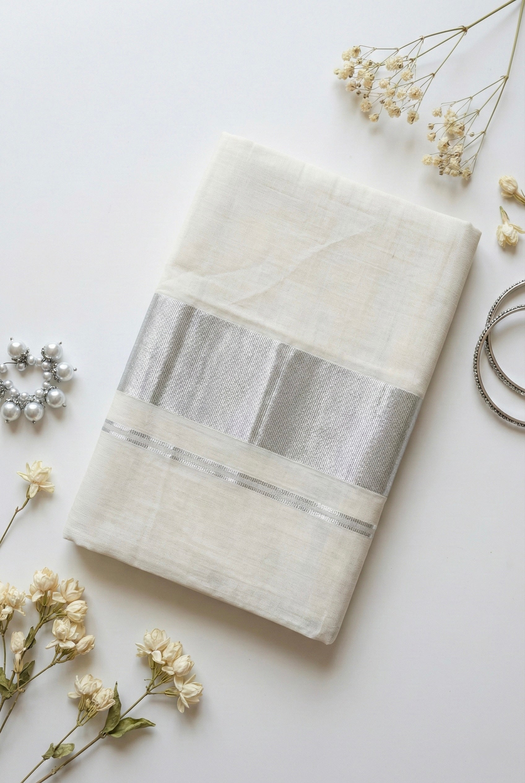 Kerala silver plain tissue saree with silver zari