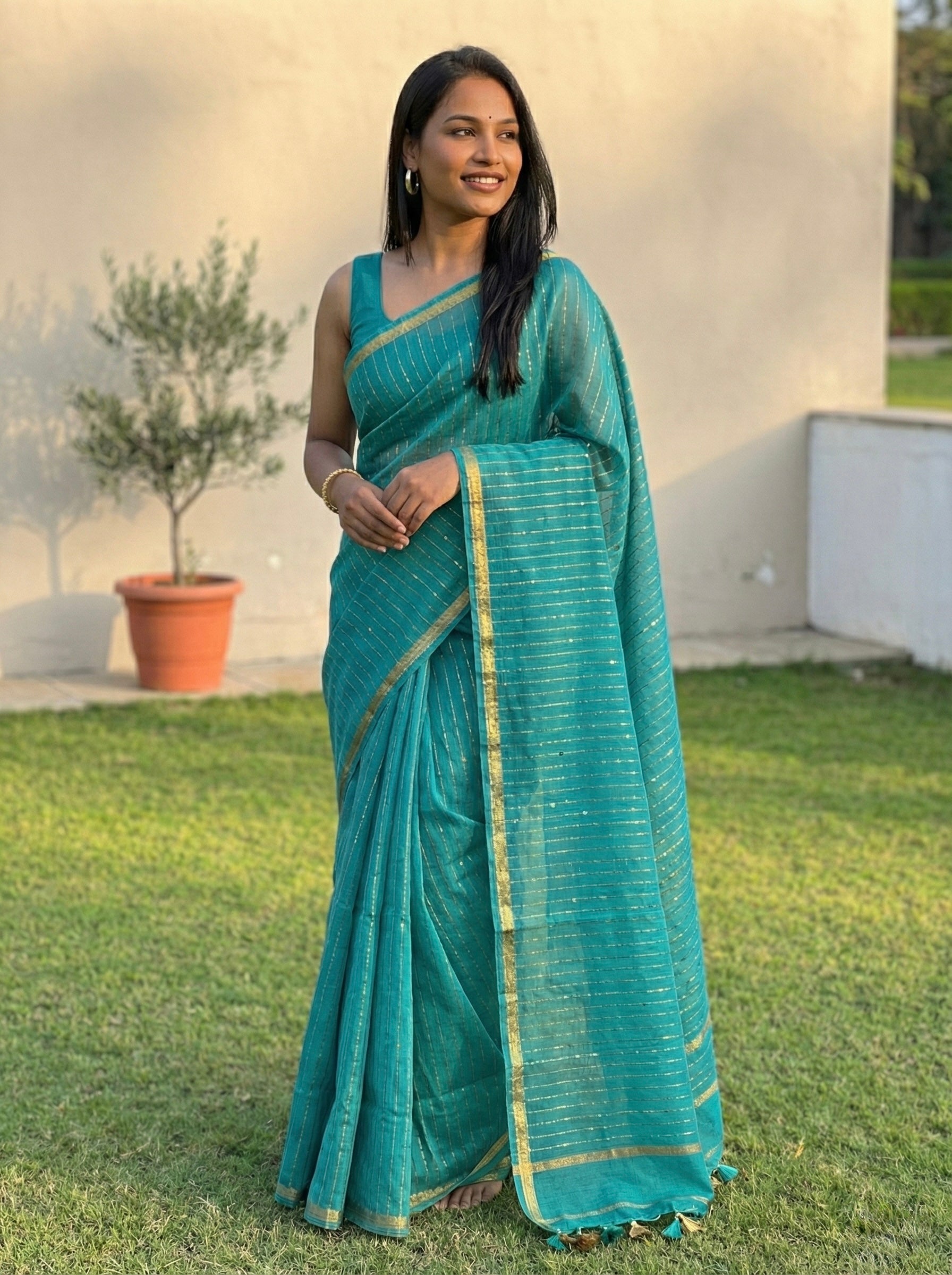 Cotton Silk Saree with gold zari stripes and Sequin pallu