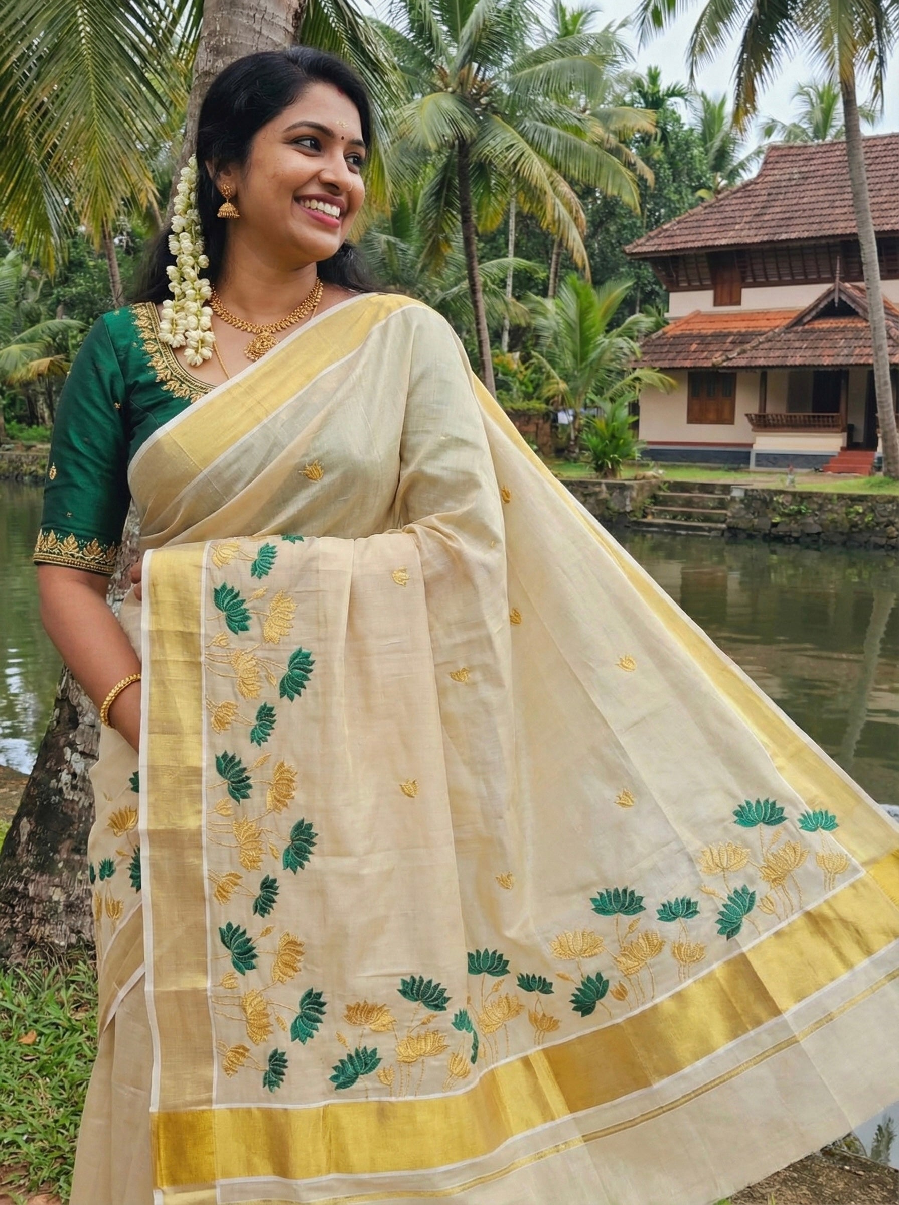 Kerala kasavu saree in lotus embroidery