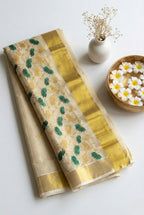 Kerala kasavu saree in tissue and lotus embroidery