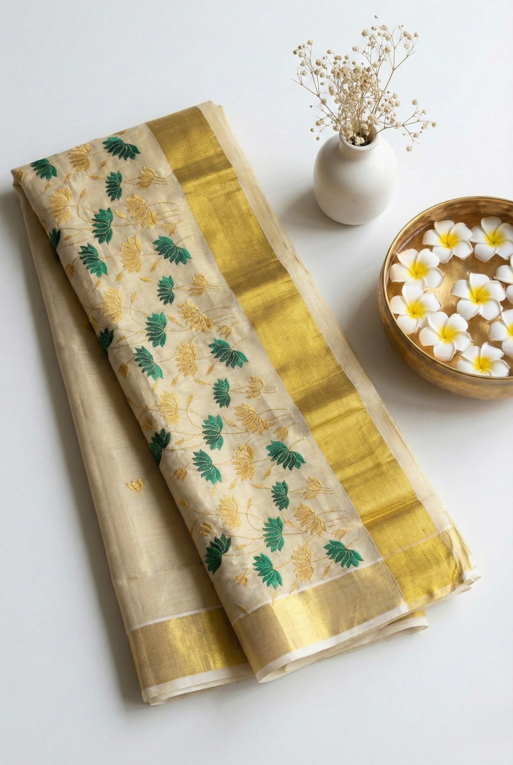 Kerala kasavu saree in lotus embroidery