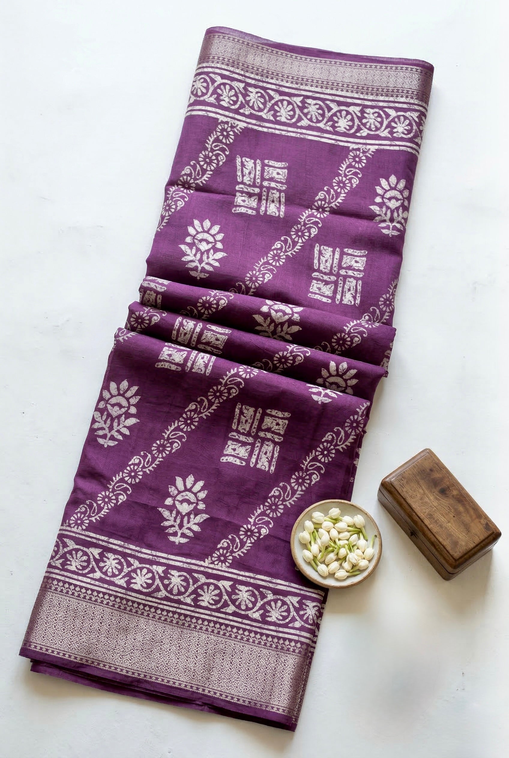 Dola silk saree with ikkat print
