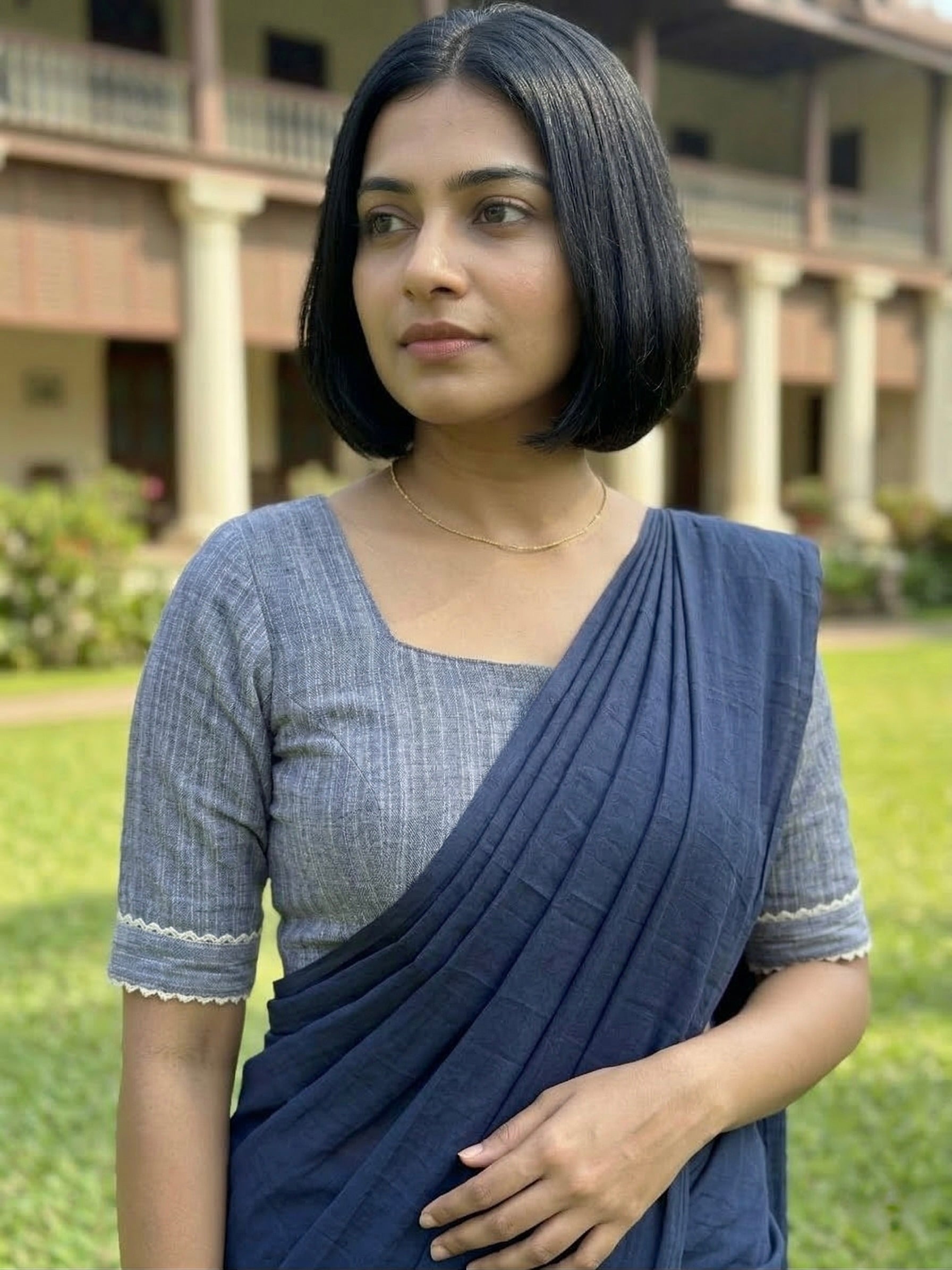 Cotton blouse with elbow length sleeves and lace detailing