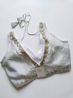 V-neck silk blouse with sequin work